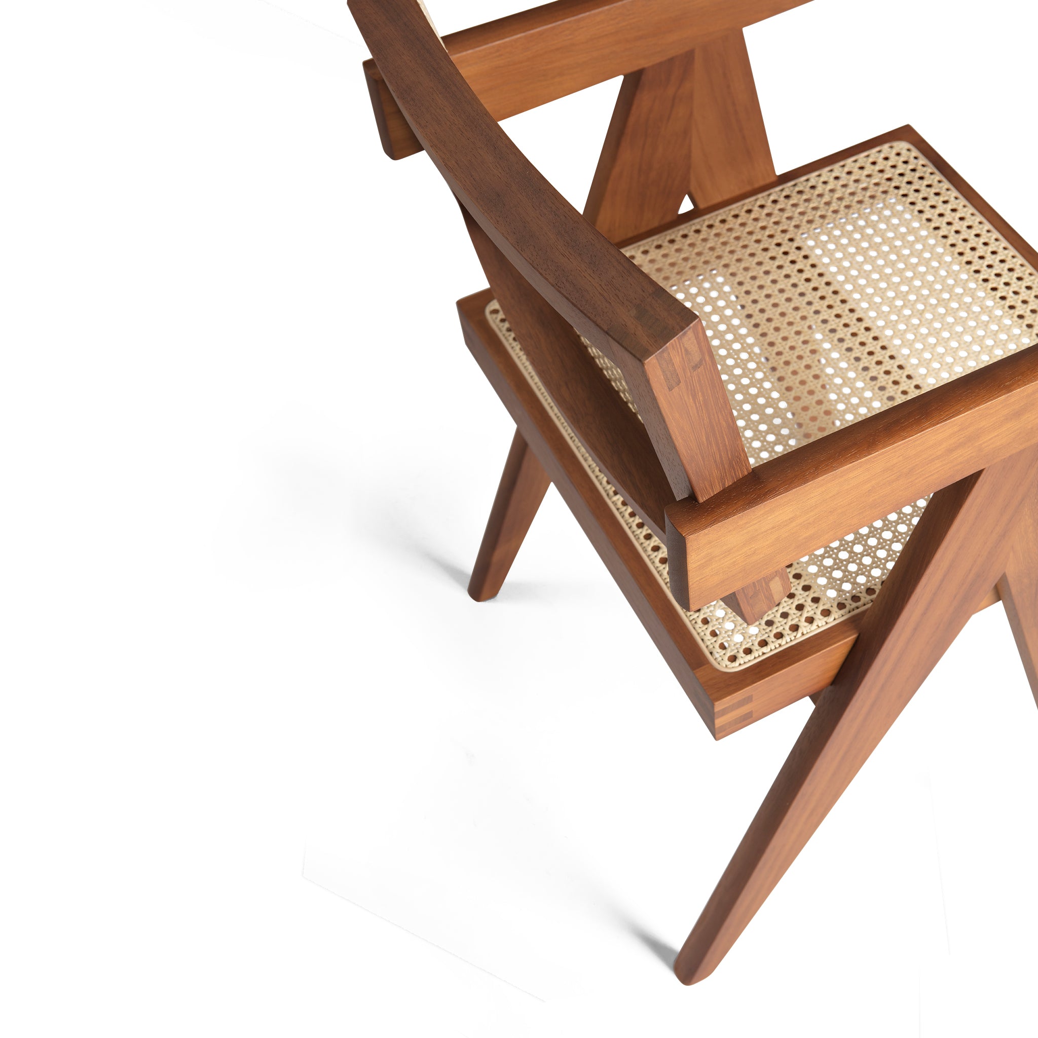 Close-up 1 of an authentic chandigarh armchair, pierre jeanneret era, teak frame, viennese cane, produced by Klarel #K34-1