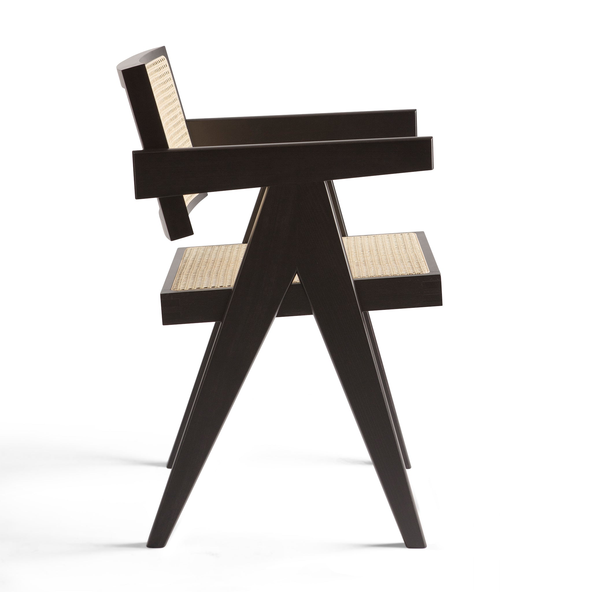 Side view of an authentic chandigarh armchair, pierre jeanneret era, black frame, viennese cane, produced by Klarel #K34-2