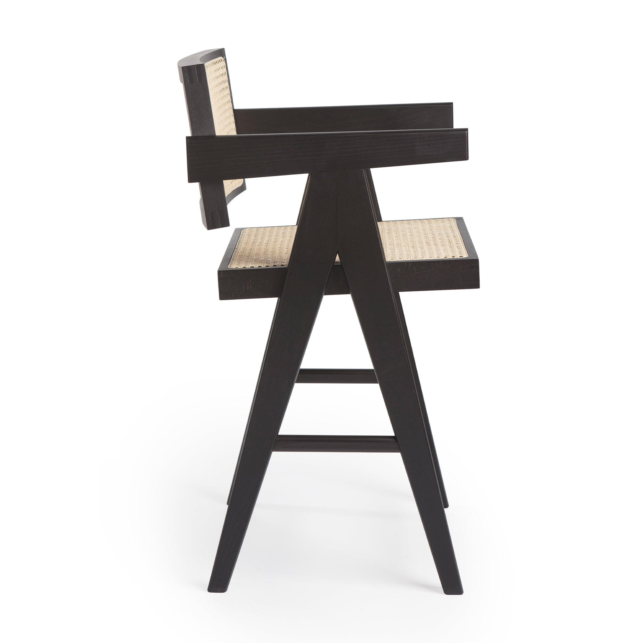 Side view of an authentic chandigarh counter stool, pierre jeanneret era, black frame, viennese cane, produced by Klarel #K37-2