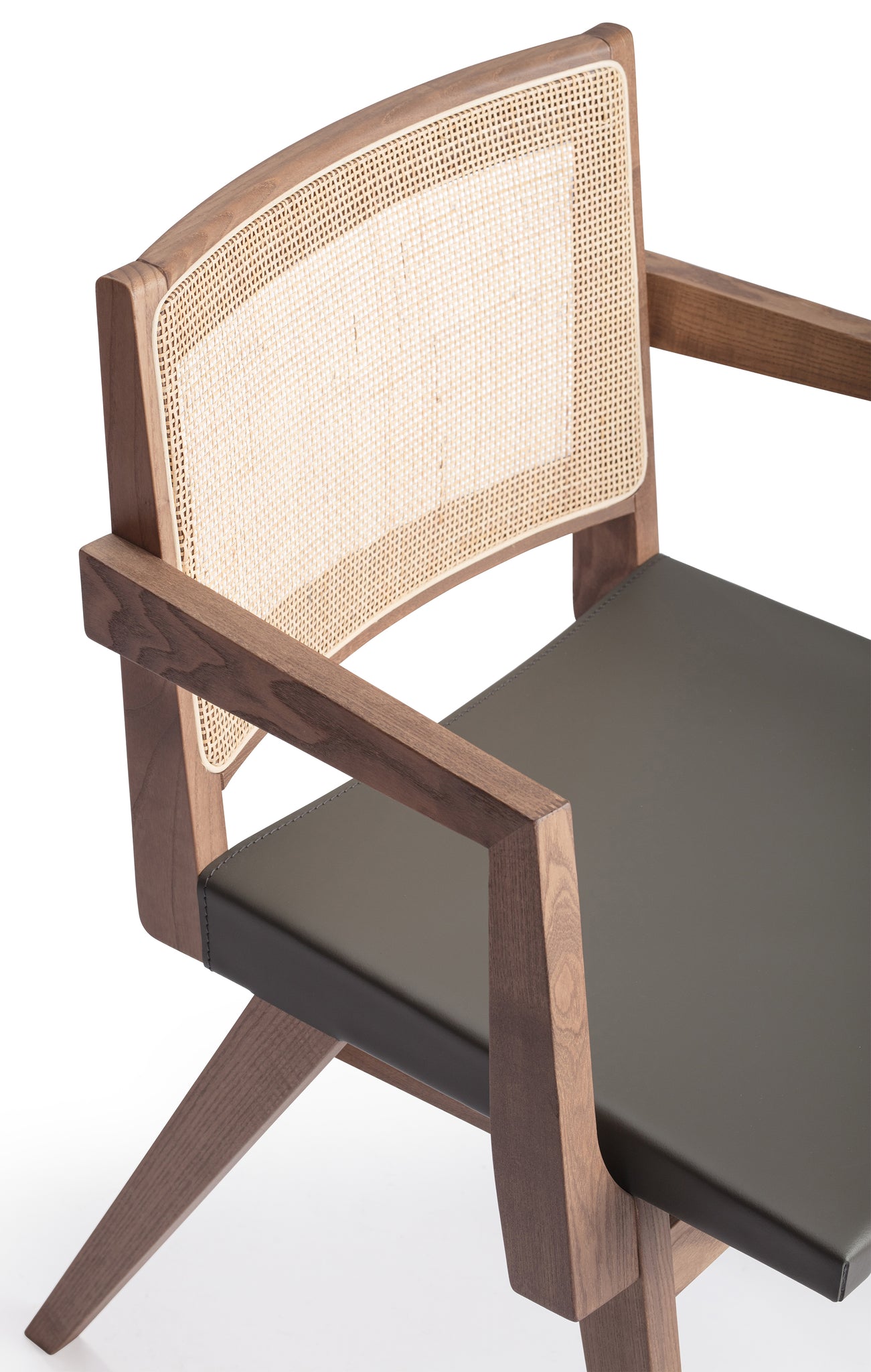 Close-up 1 of an "Elye" designer dining chair, walnut stained ash frame, square weave cane back, contract grade off white leather seat, produced by Klarel in Italy. #K40-2