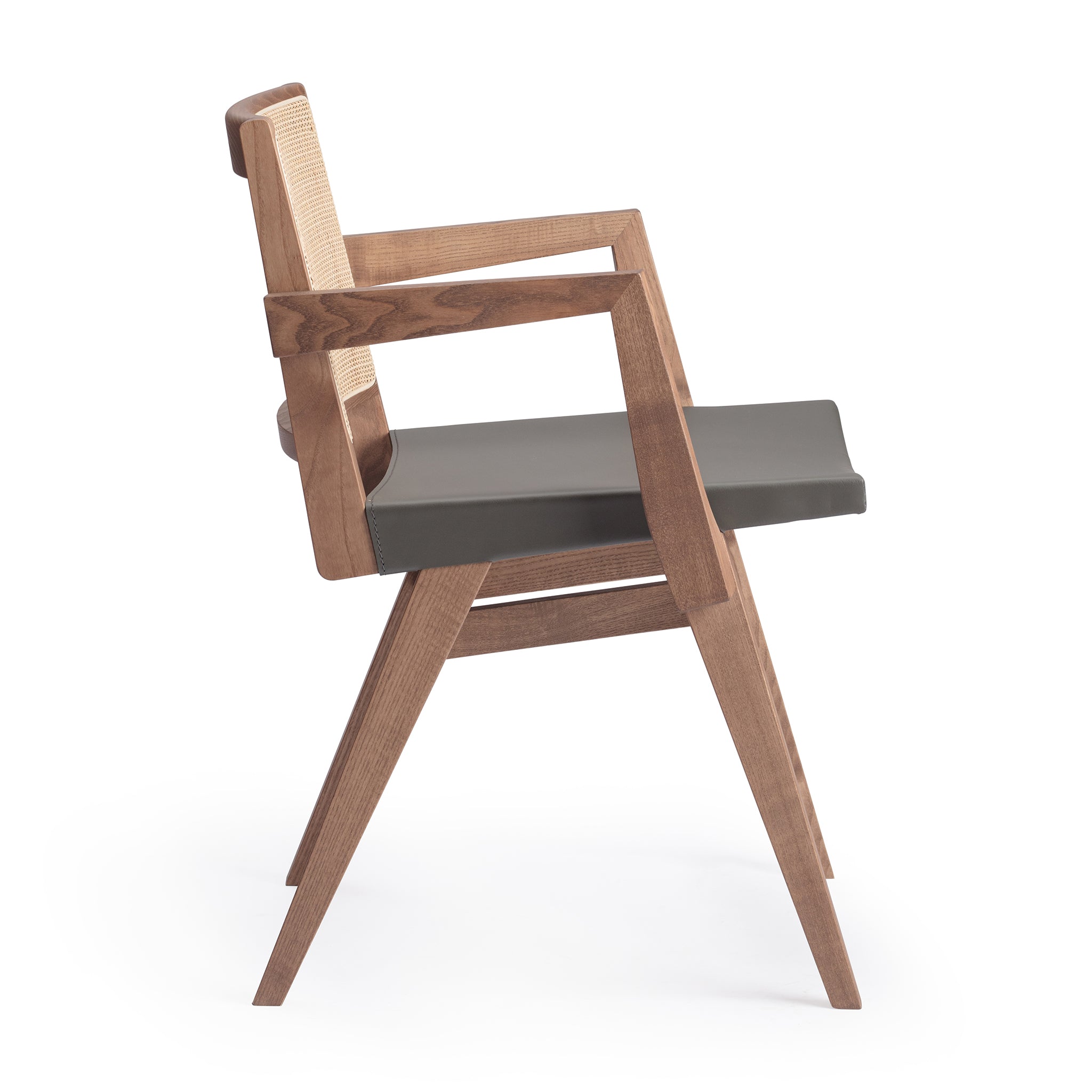 Side view of an Elye armed modern dining chair, walnut stained ash frame, square weave cane back, contract grade gray leather seat, produced by Klarel in Italy. #K40-2