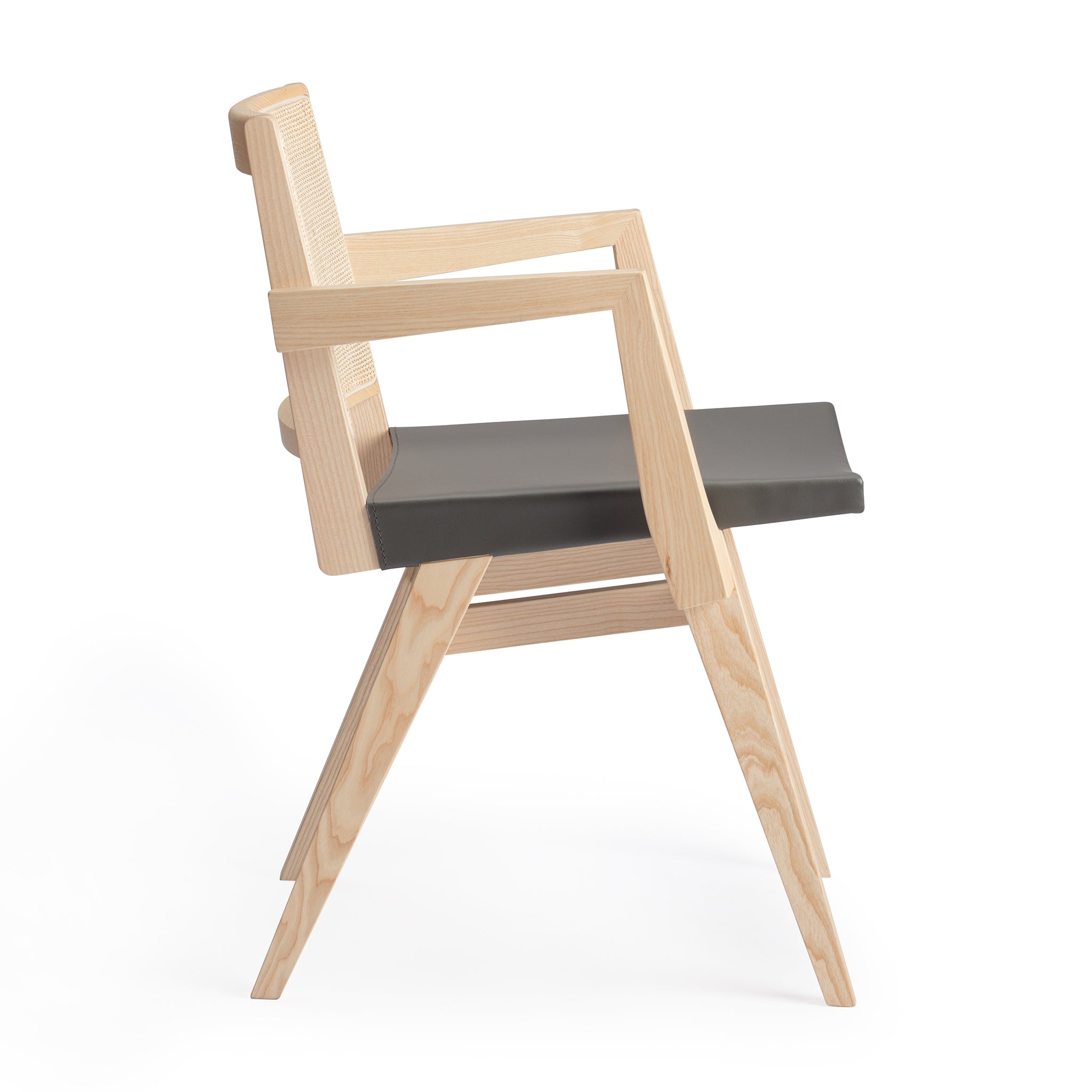 Side view of an Elye armed modern dining chair, natural ash frame, square weave cane back, contract grade gray leather seat, produced by Klarel in Italy. #K40-3