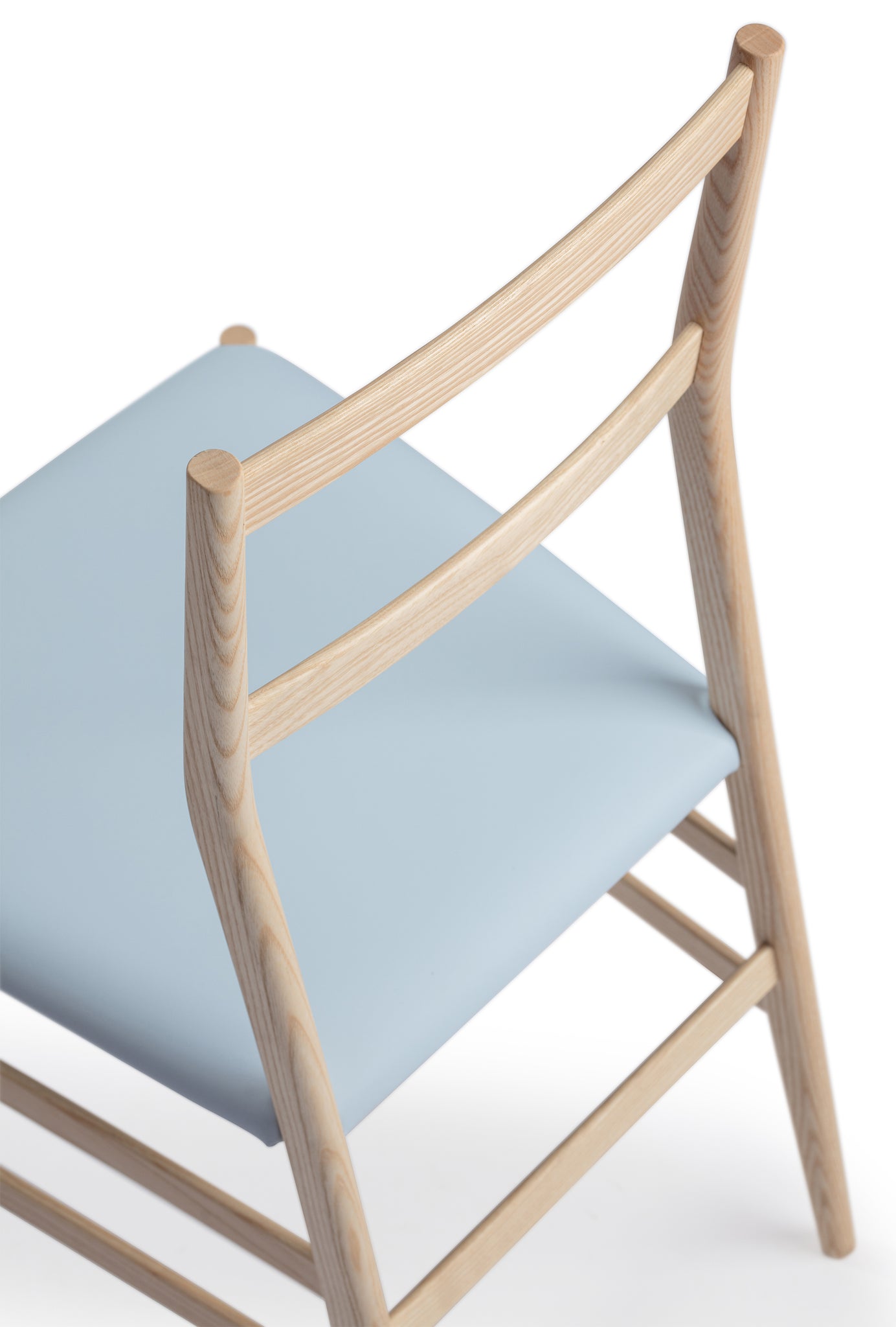 Close-up 2 of a Snella Modern Side Chair, natural ash frame blue leather seat, closely resembling the superleggera chair by Gio Ponti, ultra-lightweight at 5 lbs, contract grade. Manufactured by Klarel in Italy. #K42-2