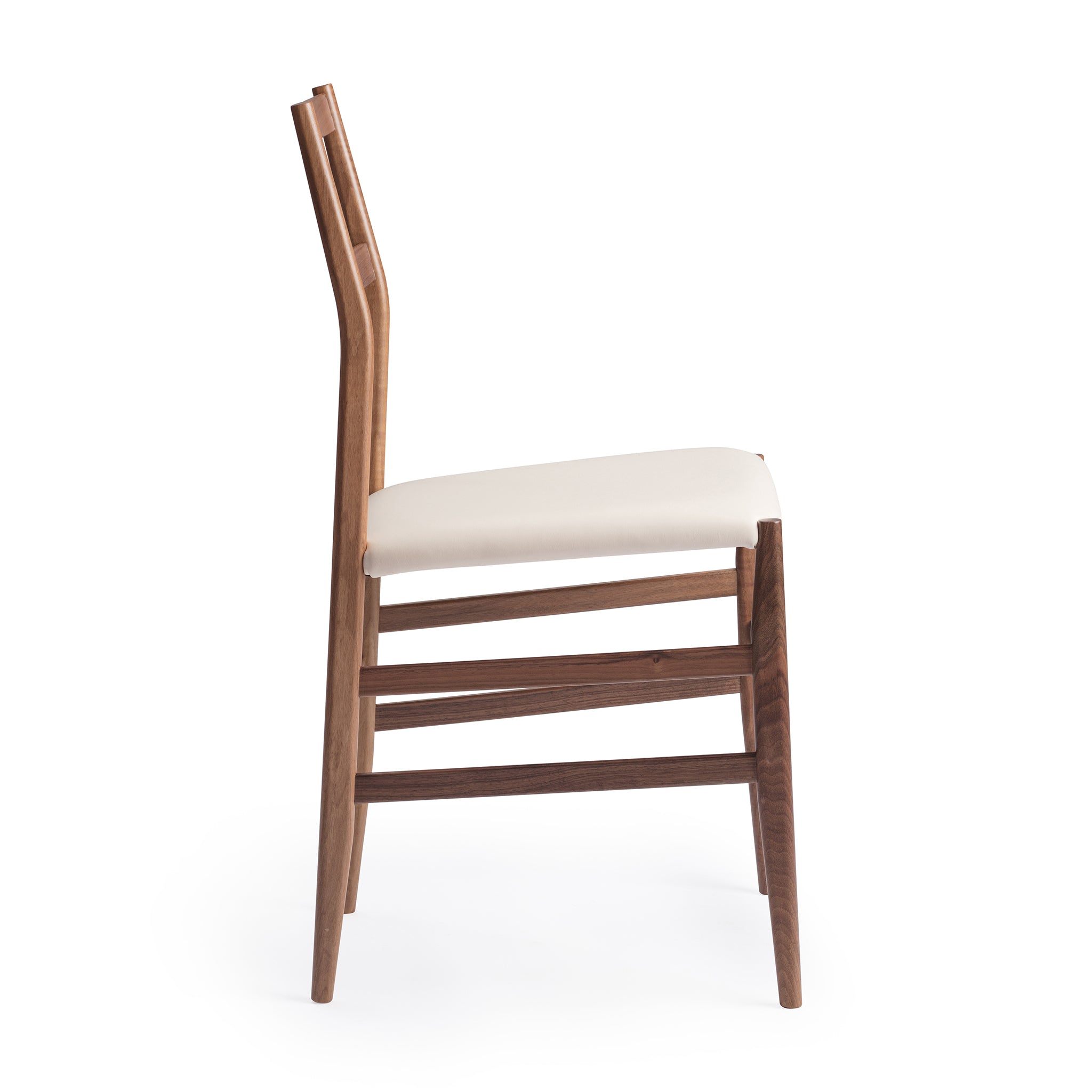 Side view of a Snella Modern Side Chair, american walnut frame, soft white leather seat, closely resembling the superleggera chair by Gio Ponti, ultra-lightweight at 5 lbs, contract grade. Manufactured by Klarel in Italy. #K42-5